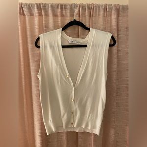White sweater vest!